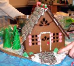 A gingerbread house made in December 2003, photographed by User:Tcr25.